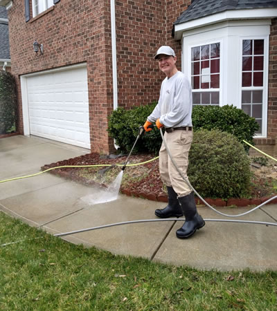 Cleaning concrete surfaces in Charlotte, North Carolina.